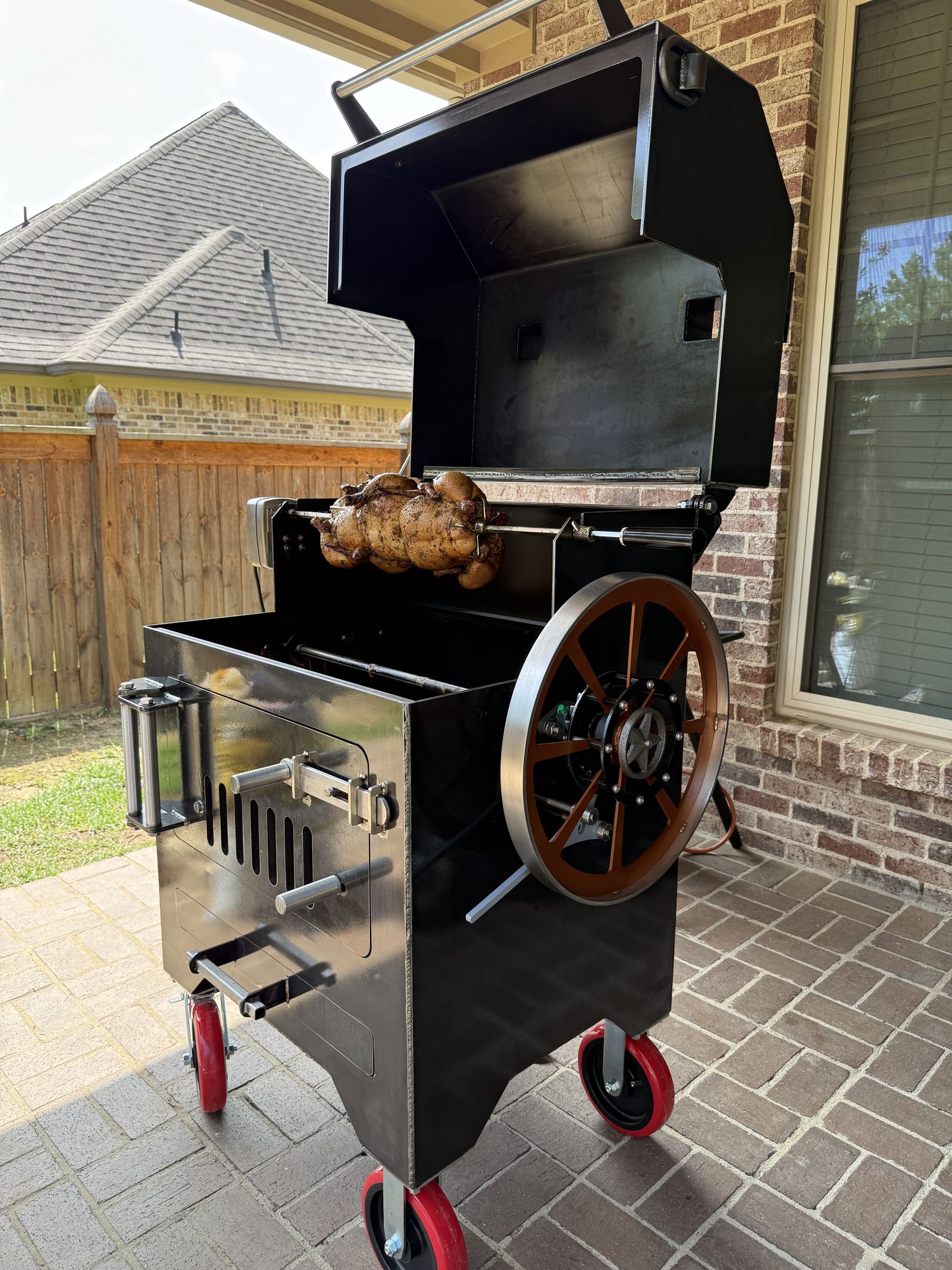 Rotisserie chicken on a Legacy cart cooker